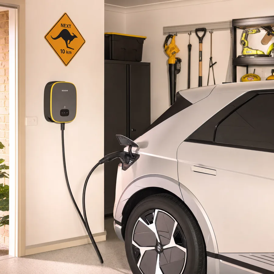 Wall-mounted EV charger in a garage