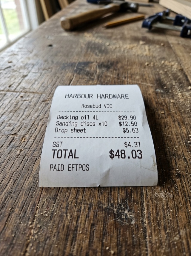 Phone photo of a Harbour Hardware receipt on a workbench